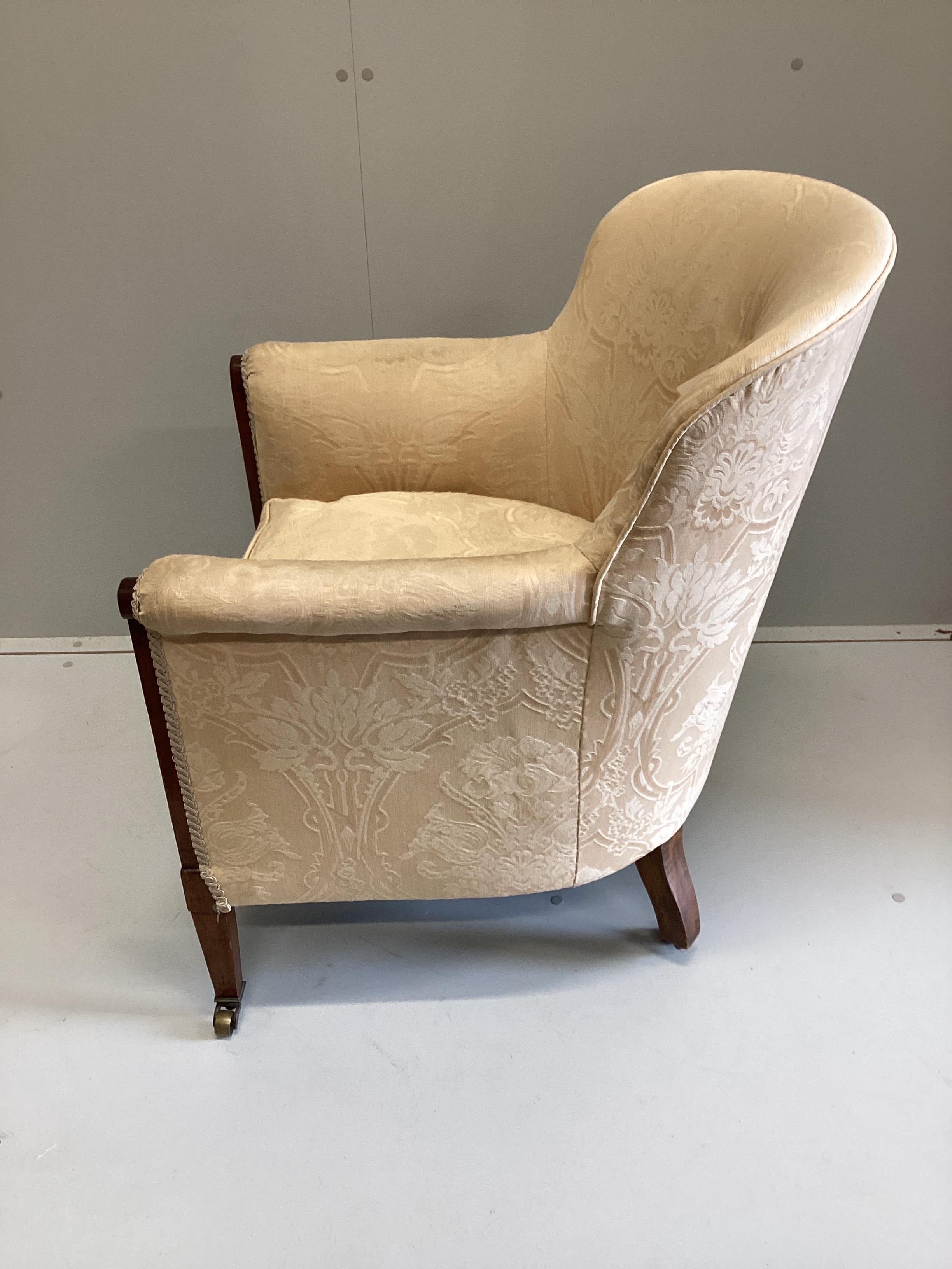 An Edwardian inlaid mahogany upholstered tub framed armchair, width 66cm, depth 67cm, height 82cm